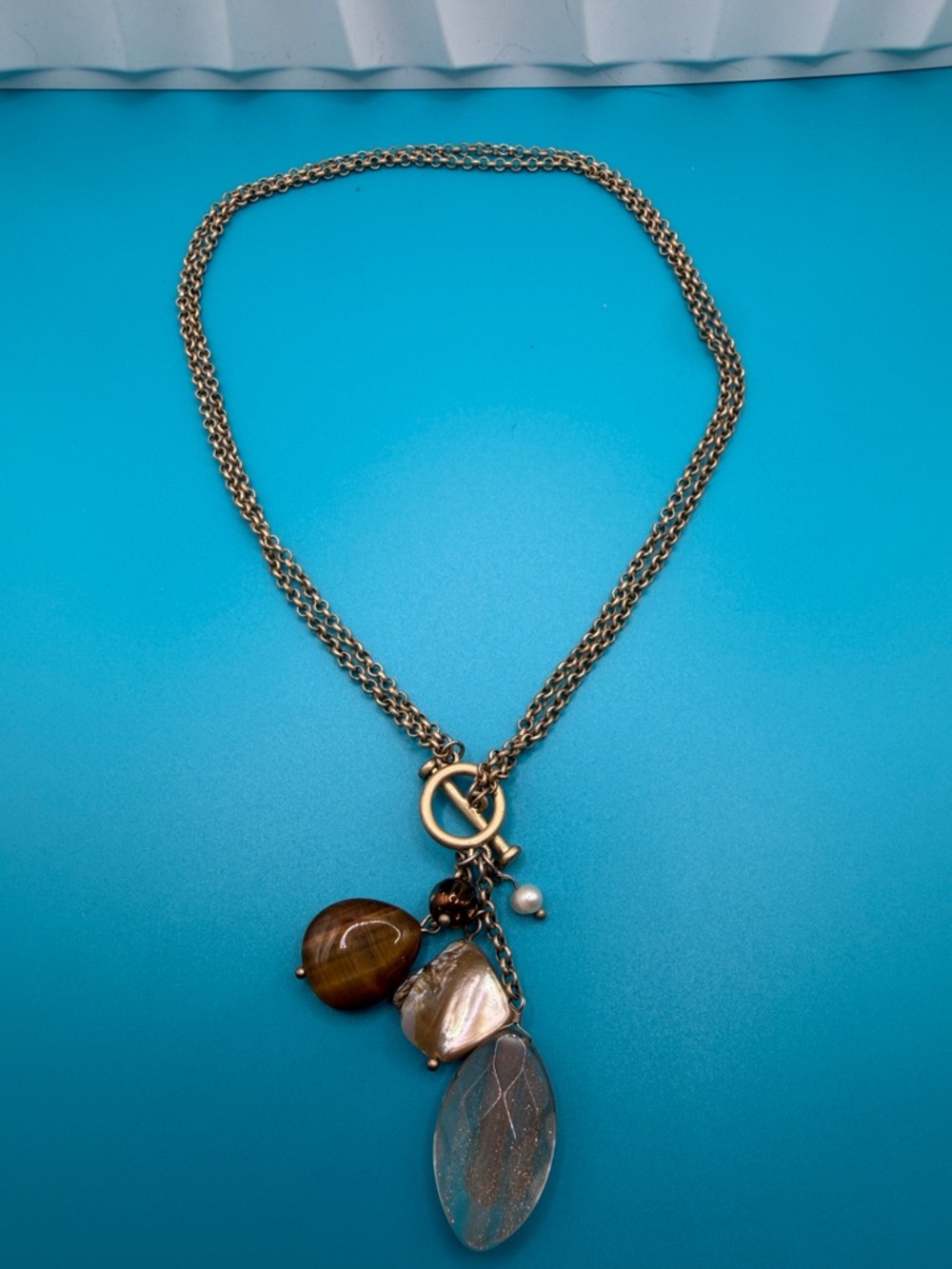 Gold-Tone Charm Pendant Necklace with Brown and Pearl Accents